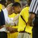 Michigan head coach John Beilein chats withs sophomore Trey Burke during a time out in the second half against Michigan State at Crisler Center on Sunday, March 3, 2013. Melanie Maxwell I AnnArbor.com